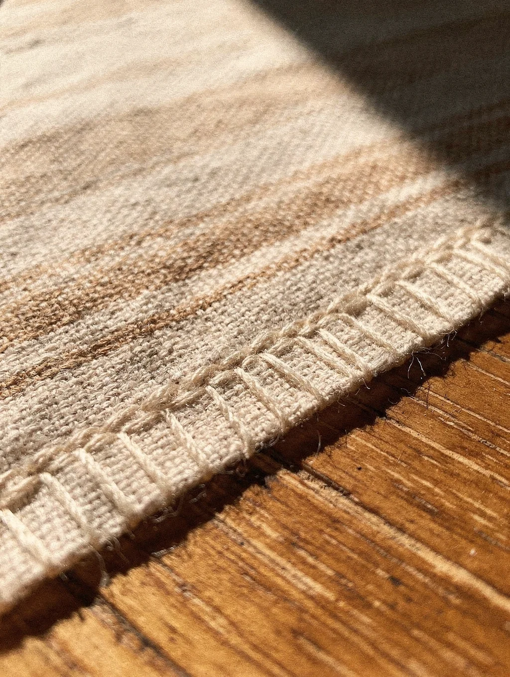 Protective cotton dust bag with stitched detailing